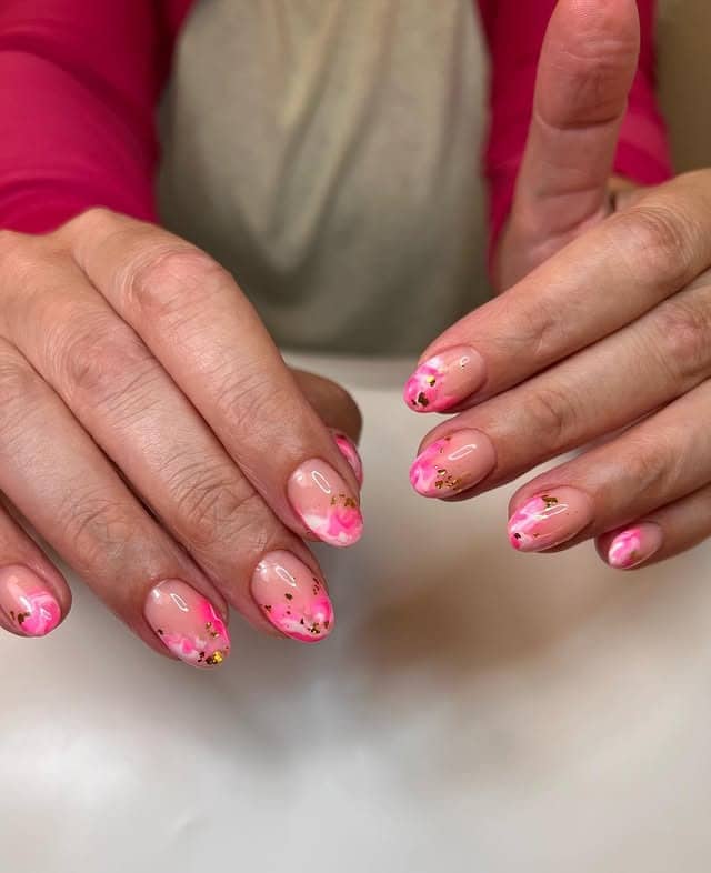 21. Pink Marble Short Nails with Gold Foil - pink nail ideas