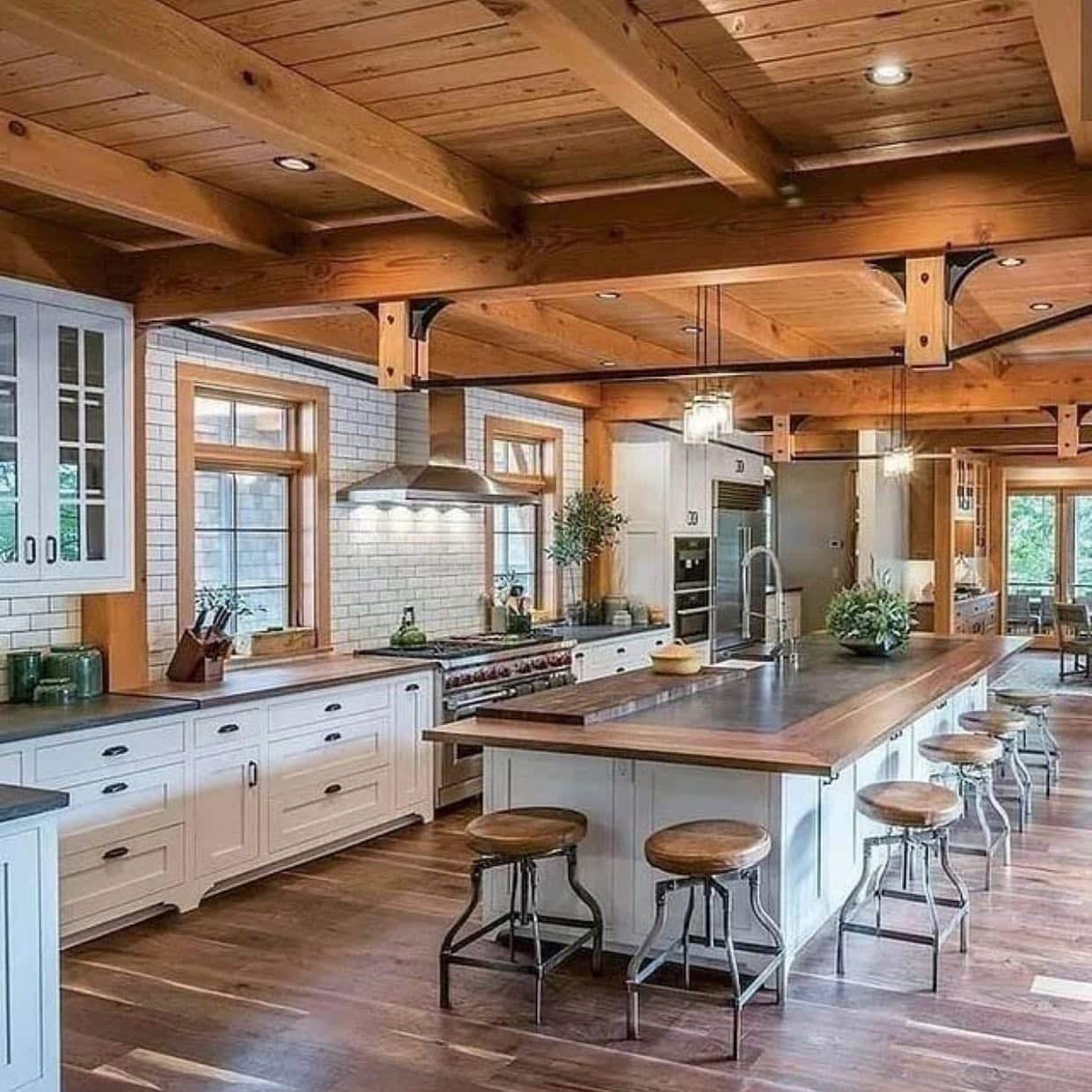 21. Rustic Farmhouse Kitchen with Natural Wood and Soft White Cabinetry - big kitchen ideas