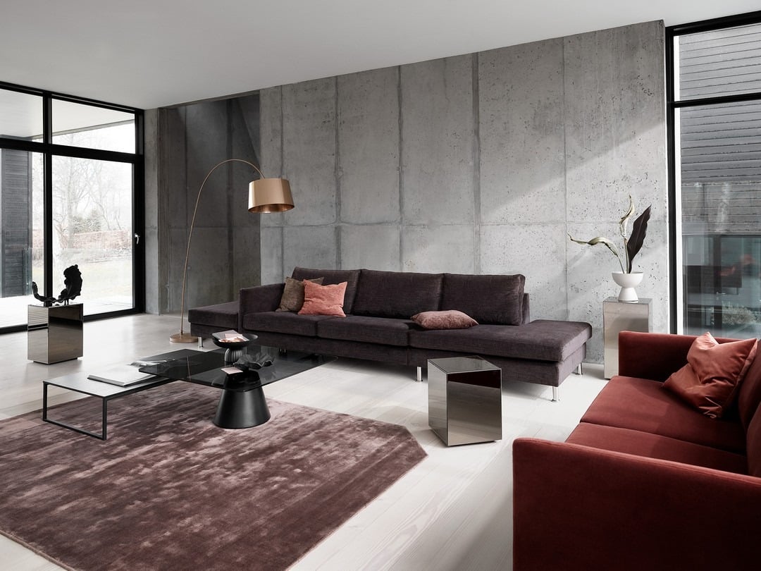 15. Dark Chocolate Sofa in Minimalist Concrete Living Space - dark brown sofa living room ideas