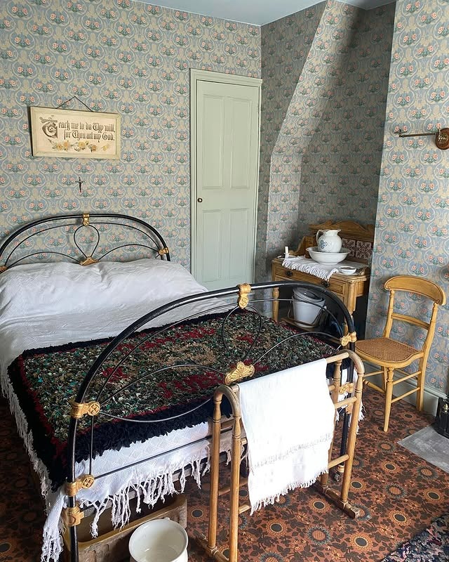 5. Vintage Patterned Wallpaper with Antique Details - victorian bedroom ideas