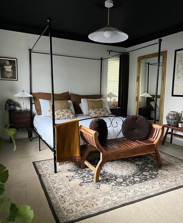 7. Four-Poster Bed with Dramatic Dark Ceiling - victorian bedroom ideas
