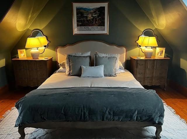 8. Moody Victorian Bedroom with Graphic Rug - victorian bedroom ideas