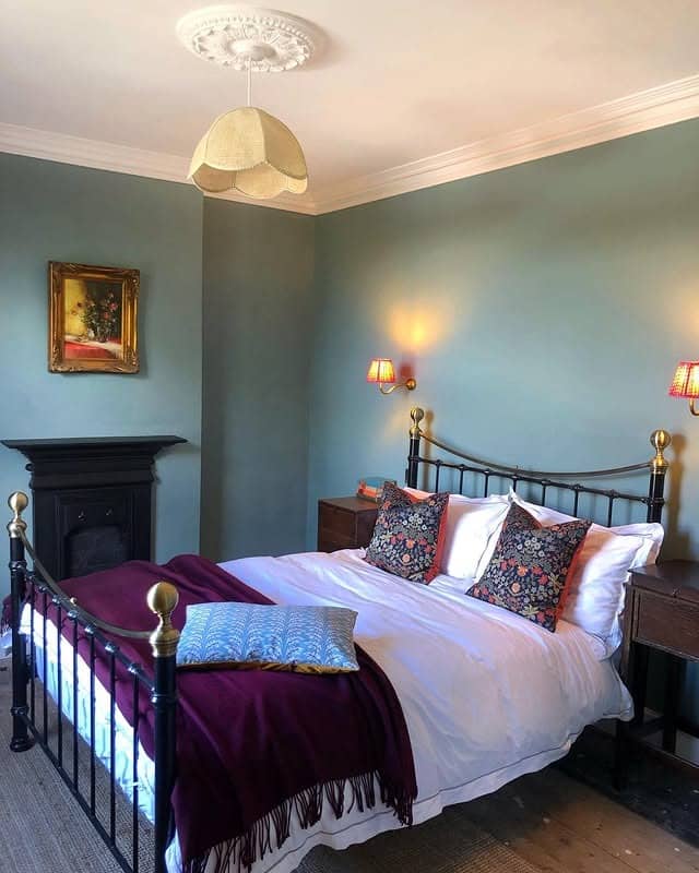 16. Muted Green Victorian Bedroom with Brass Bed Details - victorian bedroom ideas