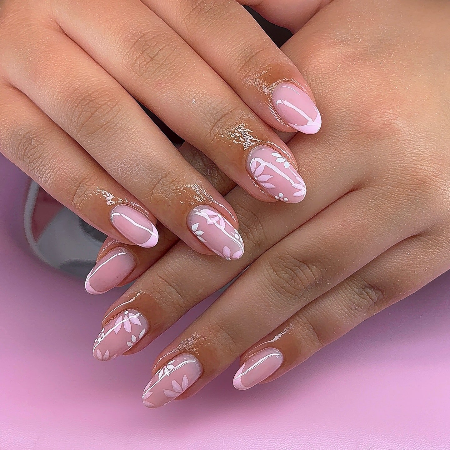 5. Baby Pink French Tip Nails with White Leaf Art - baby pink nail ideas