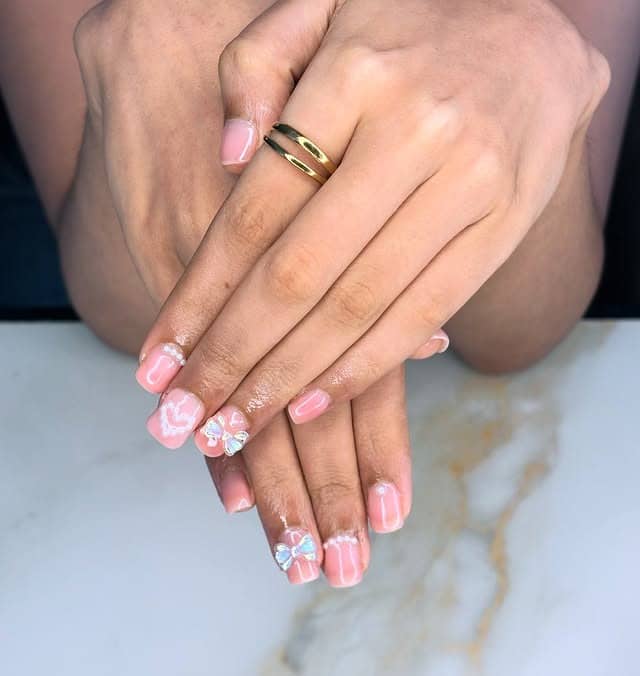 5. Short Square Pink Nails with Soft Bow Accents - nail ideas with bows