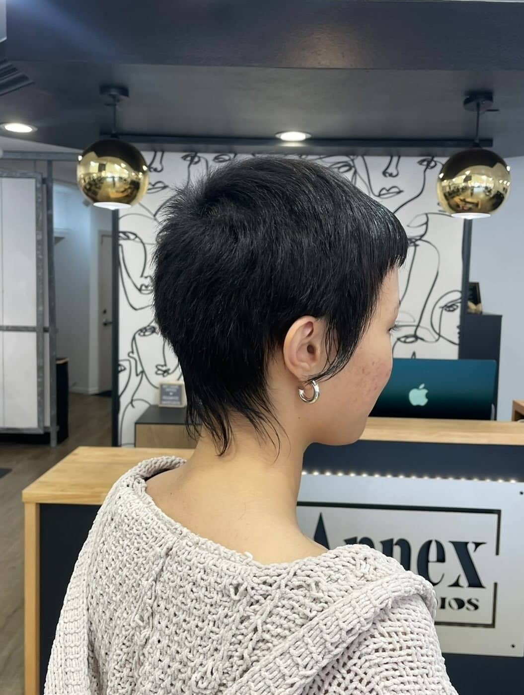1. Textured Black Pixie Mullet - Wispy Pixie Hairstyles