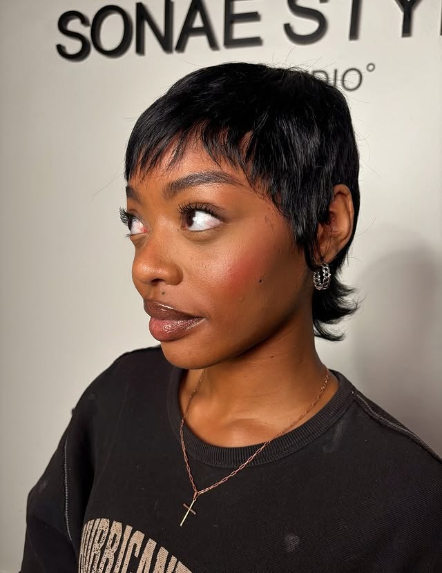 16. Sleek Black Tapered Pixie Mullet - Wispy Pixie Hairstyles