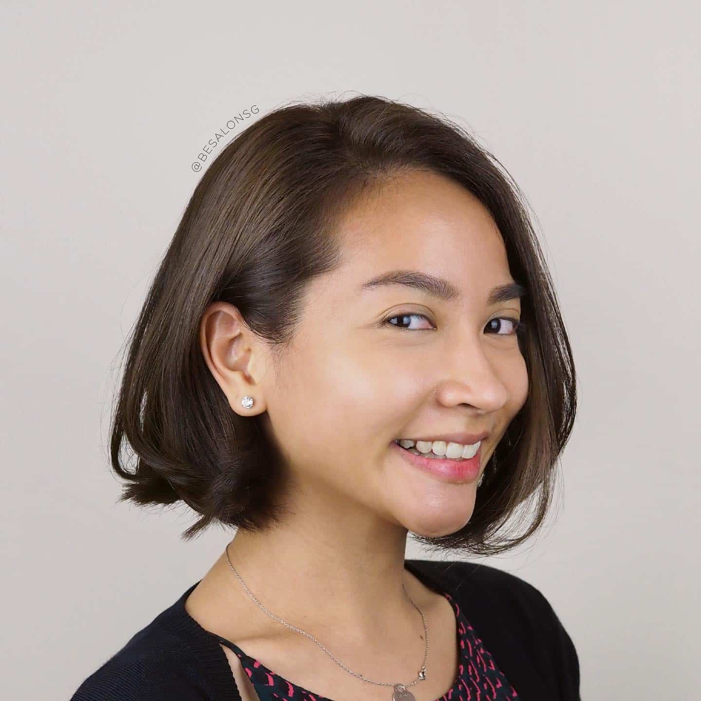 6. Sleek Rounded Bob with Deep Brunette Tone - Tousled Bob Haircut