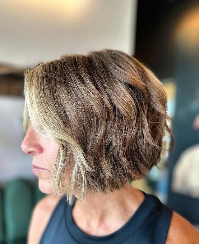 7. Dimensional Brunette Bob with Face-Framing Lightness - Tousled Bob Haircut