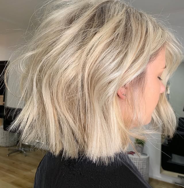 15. Choppy Platinum Blonde Tousled Bob - Tousled Bob Haircut