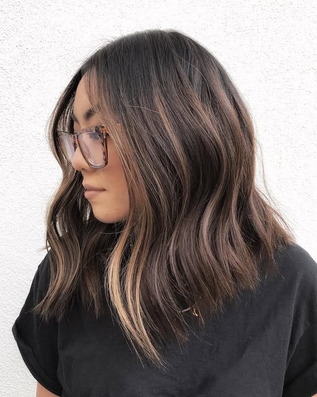19. Dimensional Brunette Bob with Soft Highlights - Tousled Bob Haircut