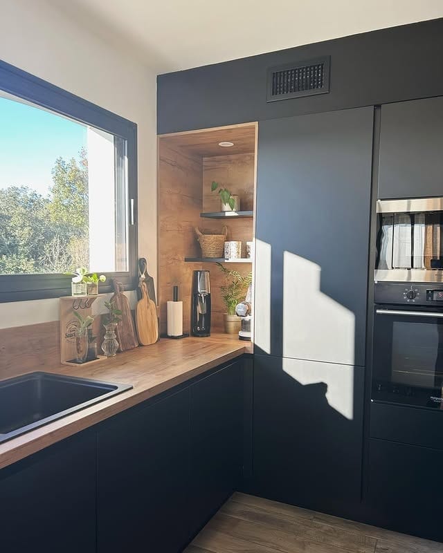 2. Minimal Black and Wood Corner Kitchen - black and wood kitchen ideas