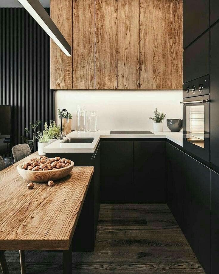 4. Contemporary Black Kitchen with Textured Wood Panels - black and wood kitchen ideas
