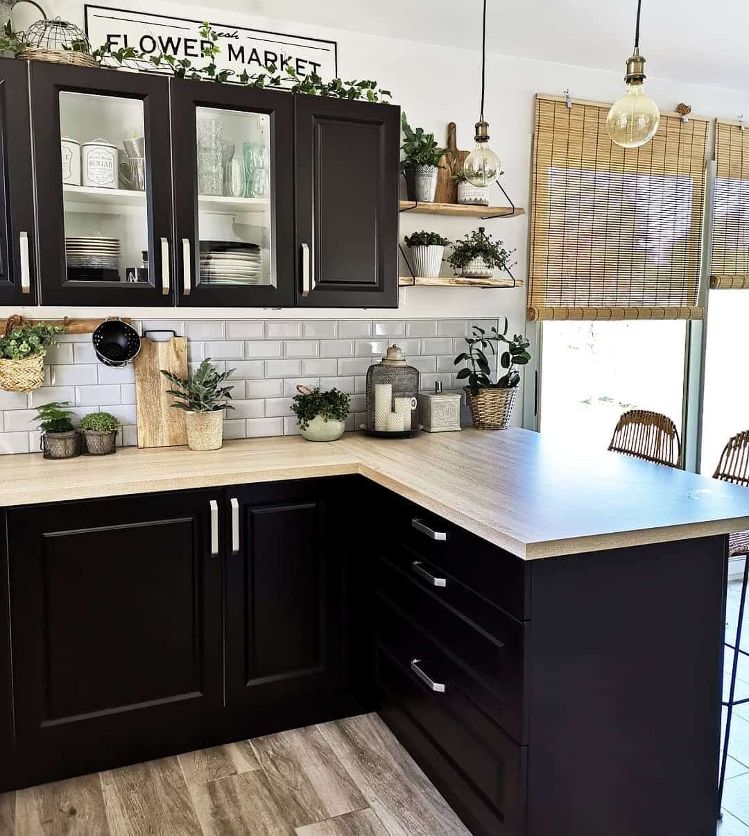 9. Farmhouse Black Kitchen with Wood Countertops - black and wood kitchen ideas