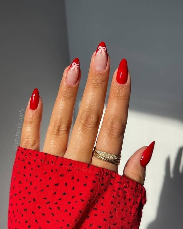 2. Classic Red Almond Nails with Minimal Bow Accent - red nail ideas