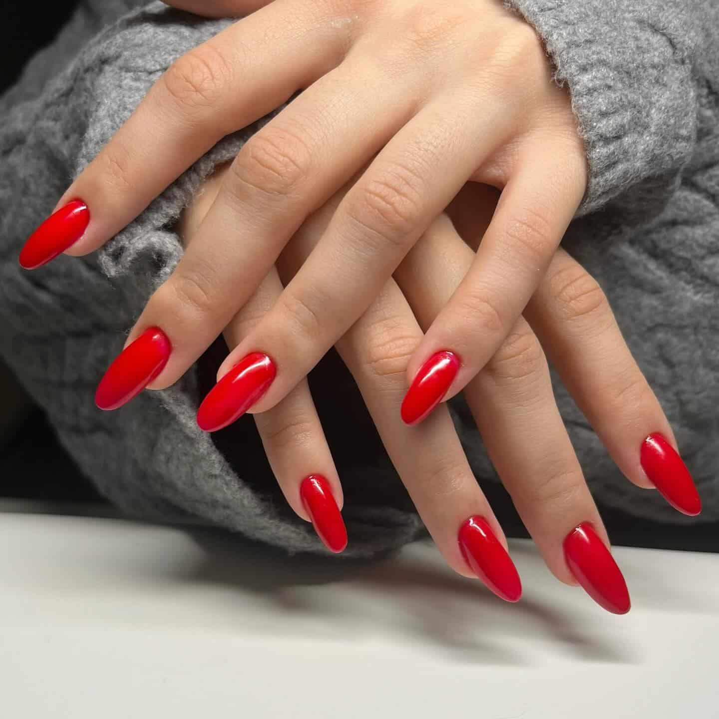 3. Timeless Bright Red Oval Nails - red nail ideas