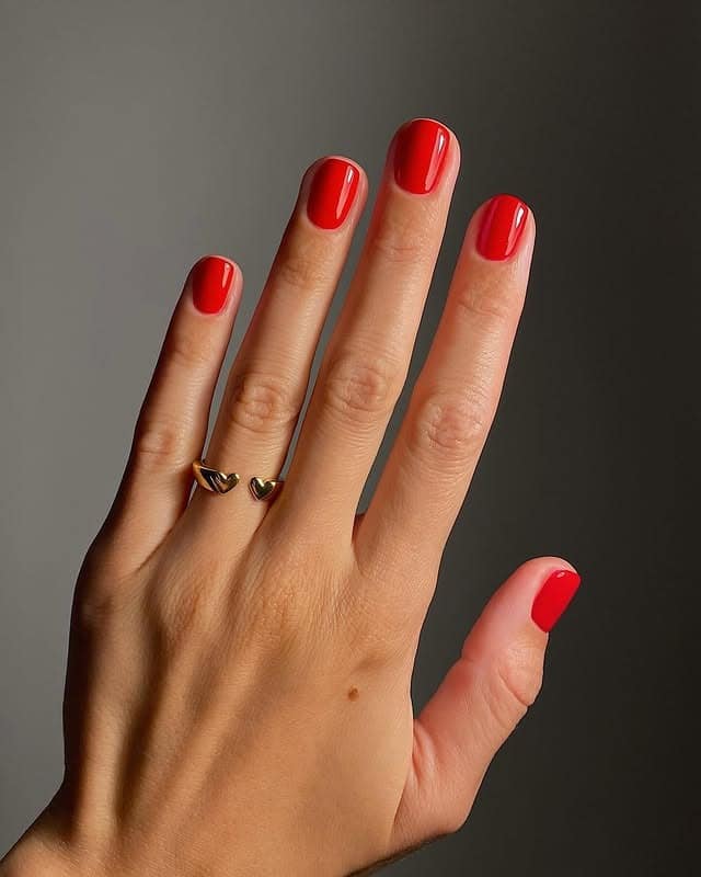 10. Minimal Short Red Natural Nails - red nail ideas