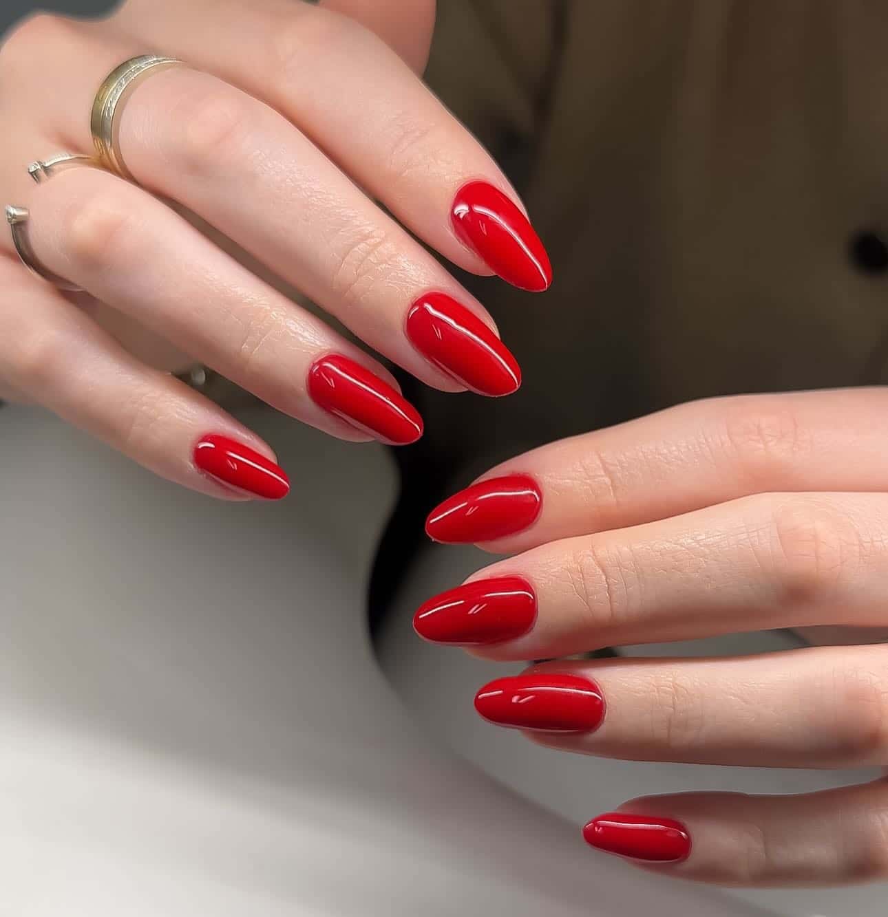22. Classic Glossy Red Almond Nails - red nail ideas