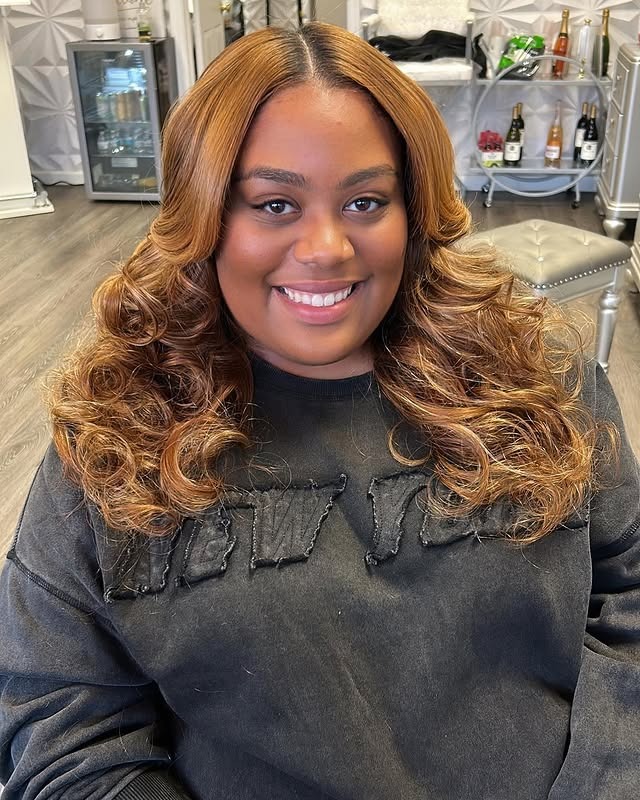 9. Middle Part Voluminous Curls Warm Caramel Brown - Middle Part Hairstyles