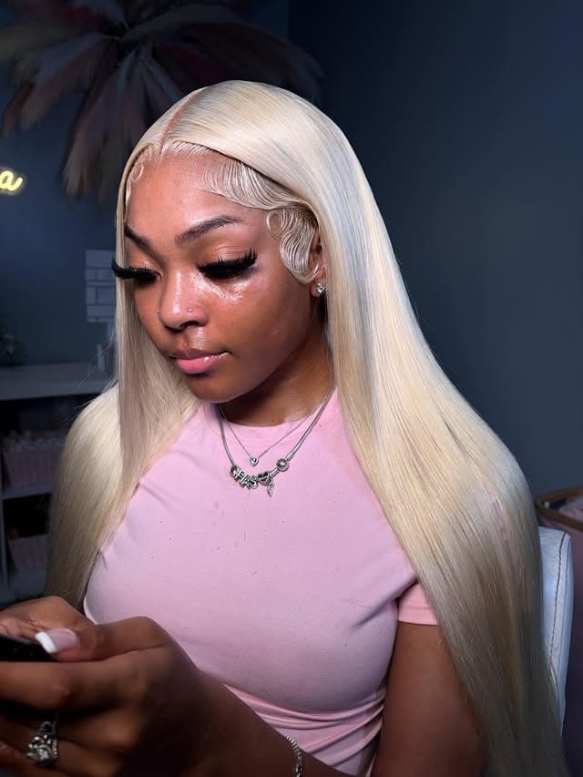 12. Sleek Middle Part Platinum Blonde Straight - Middle Part Hairstyles