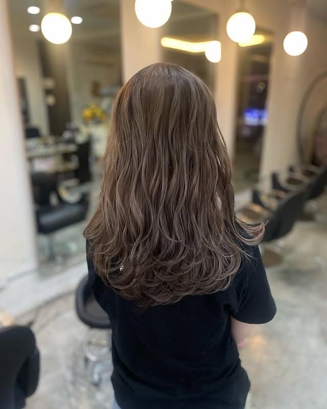 1. Soft Layered Sandy Brown Waves - Sandy Brown Hair Color