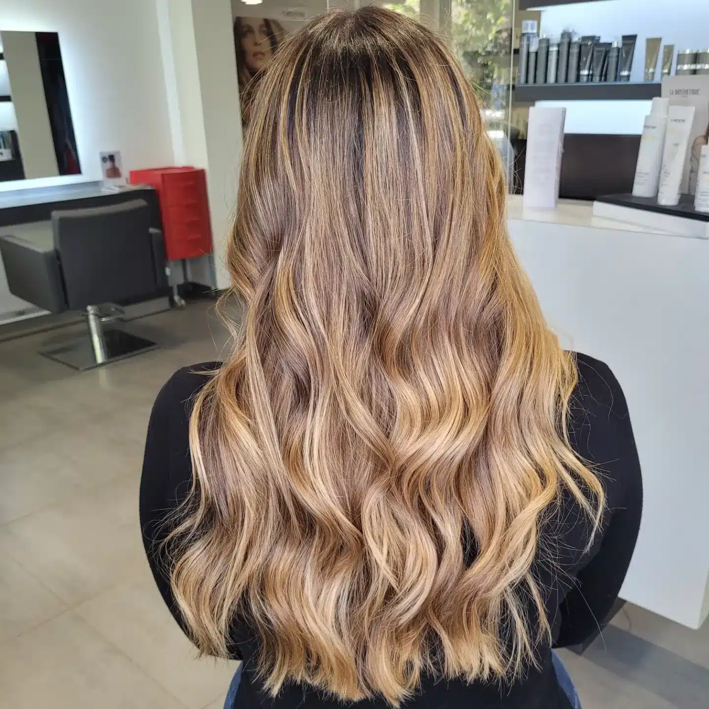 5. Dimensional Sandy Brown Highlights - Sandy Brown Hair Color