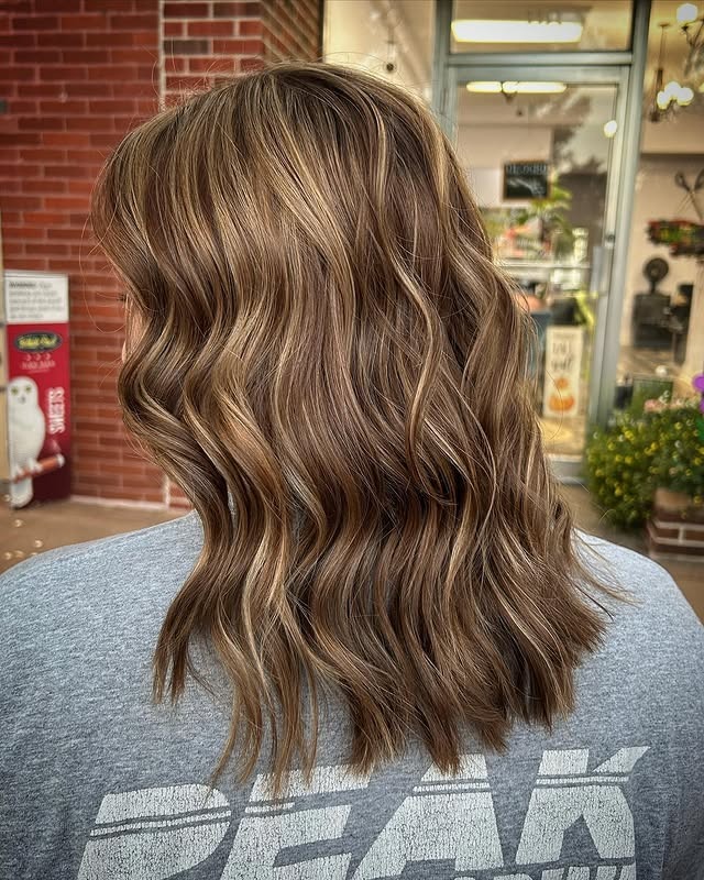 9. Textured Sandy Brown Beach Waves - Sandy Brown Hair Color