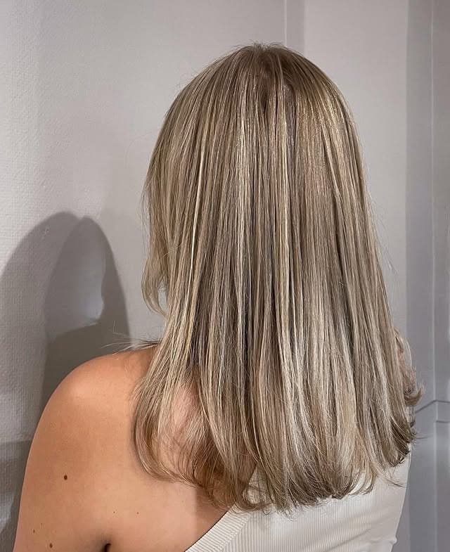 11. Soft Sandy Blonde Straight Layers - Sandy Brown Hair Color