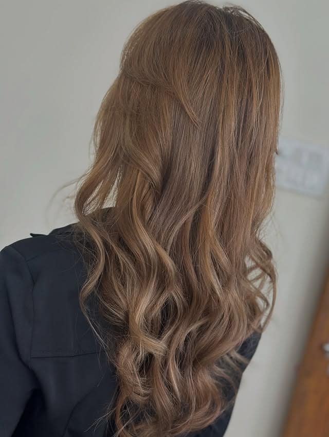 20. Warm Sandy Brown Long Layered Waves - Sandy Brown Hair Color