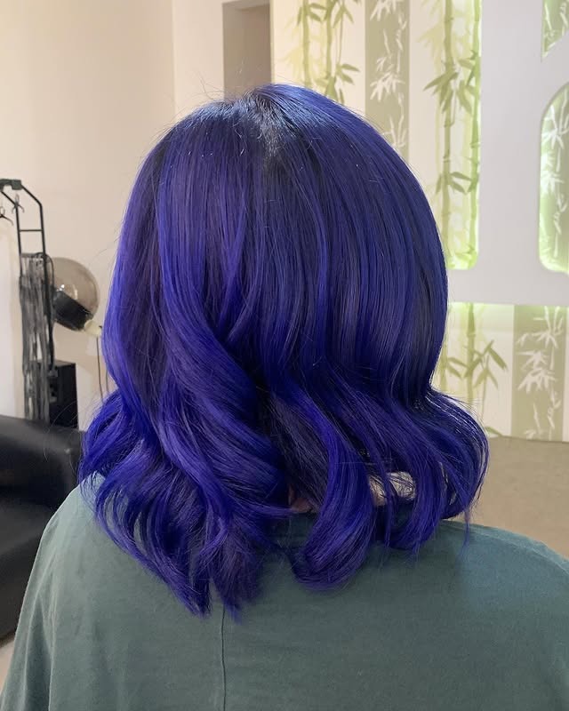 13. Vibrant Blue Soft Curl Lob - Midnight Blue Hair Color