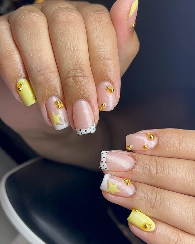2. Short Square Pastel Yellow Star Accent Nails - school nail ideas