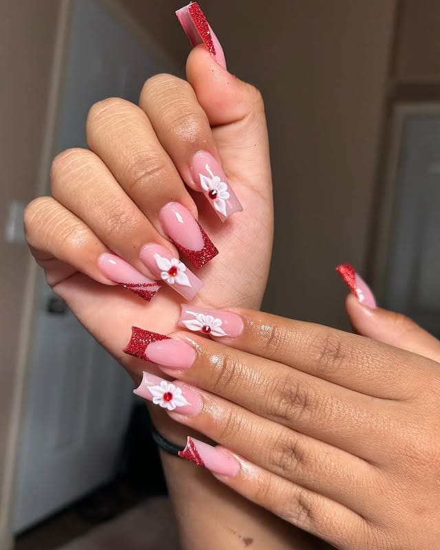 11. Long Coffin Pink and Red Glitter Floral French Tips - school nail ideas