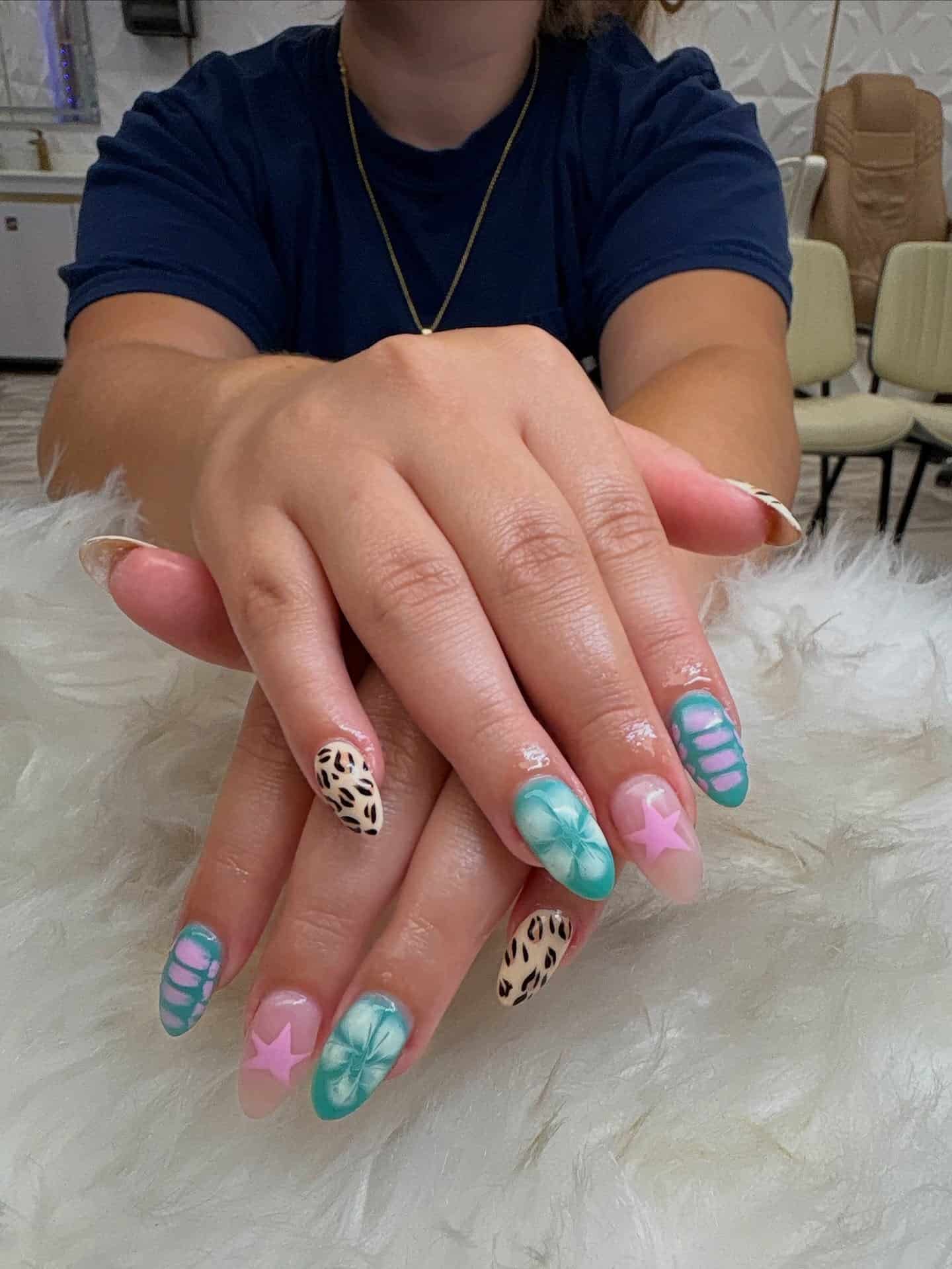 12. Almond Mixed Art in Teal, Pink, and Black Print - school nail ideas