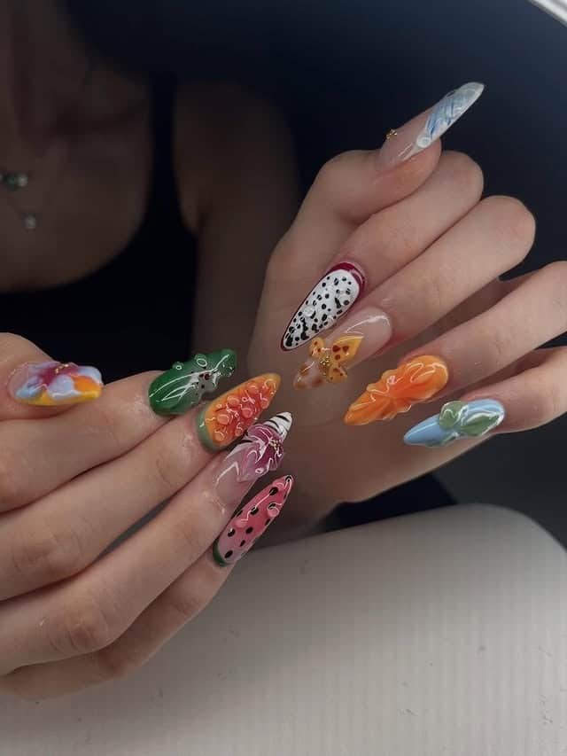 13. Stiletto Fruit-Inspired Multicolor 3D Nail Art - school nail ideas