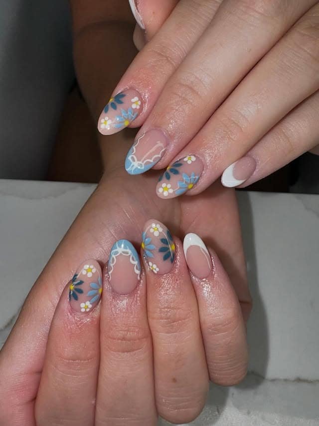 14. Short Almond Blue Floral French with White Tips - school nail ideas