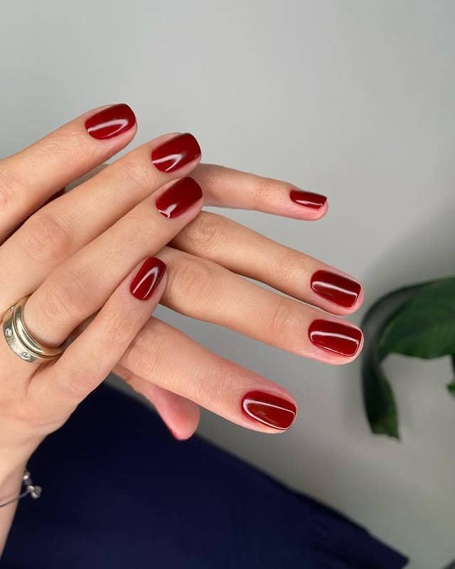 3. Deep Bordeaux Gloss Oval Nails - old money nail ideas