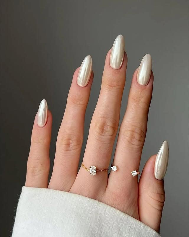 20. Pearl Chrome Almond Nails in Soft Ivory - old money nail ideas