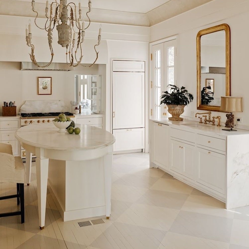 1. Classic Cream Kitchen with Antique Brass Accents - cream kitchen cabinet ideas