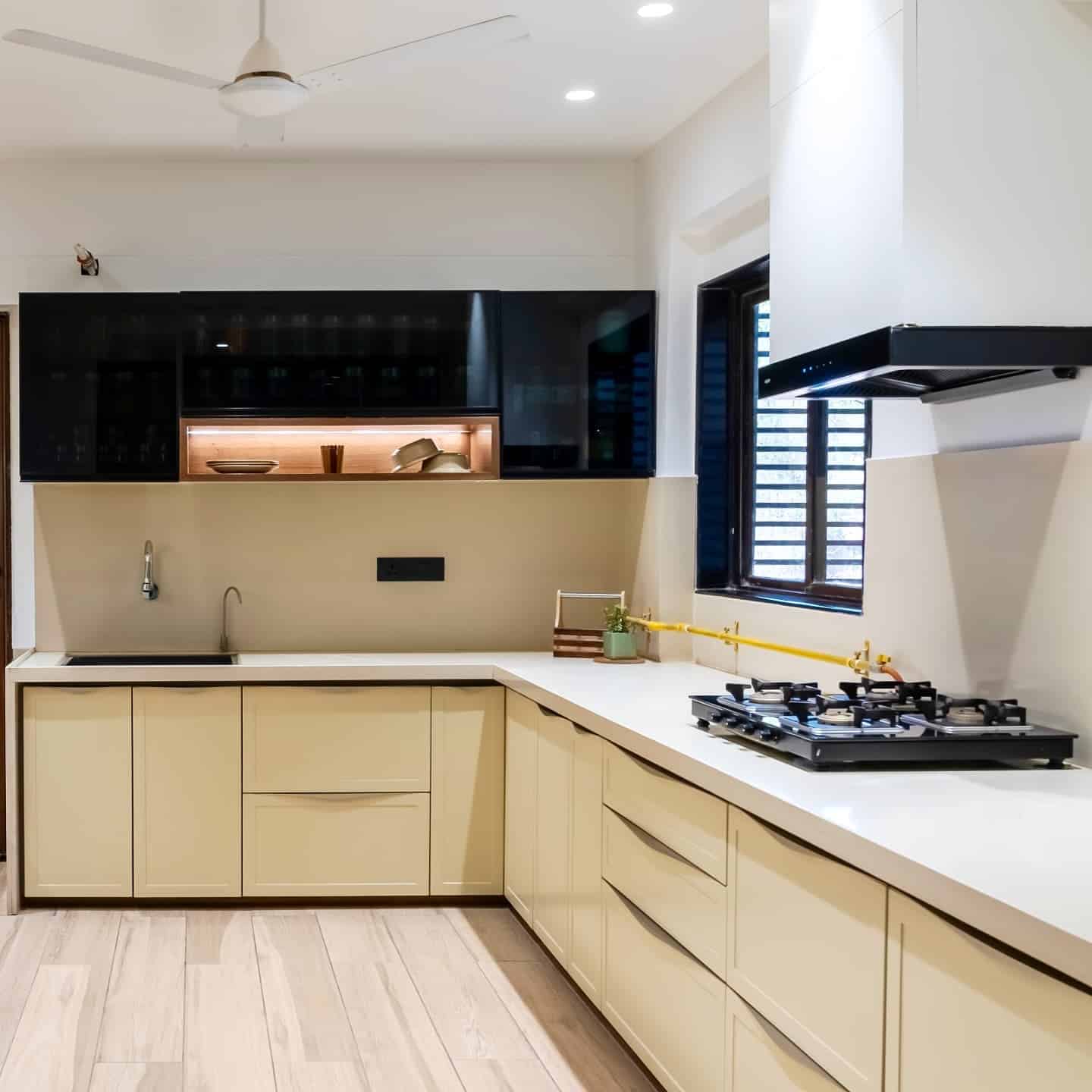 9. Modern Cream Kitchen with Minimalist Accents - cream kitchen cabinet ideas