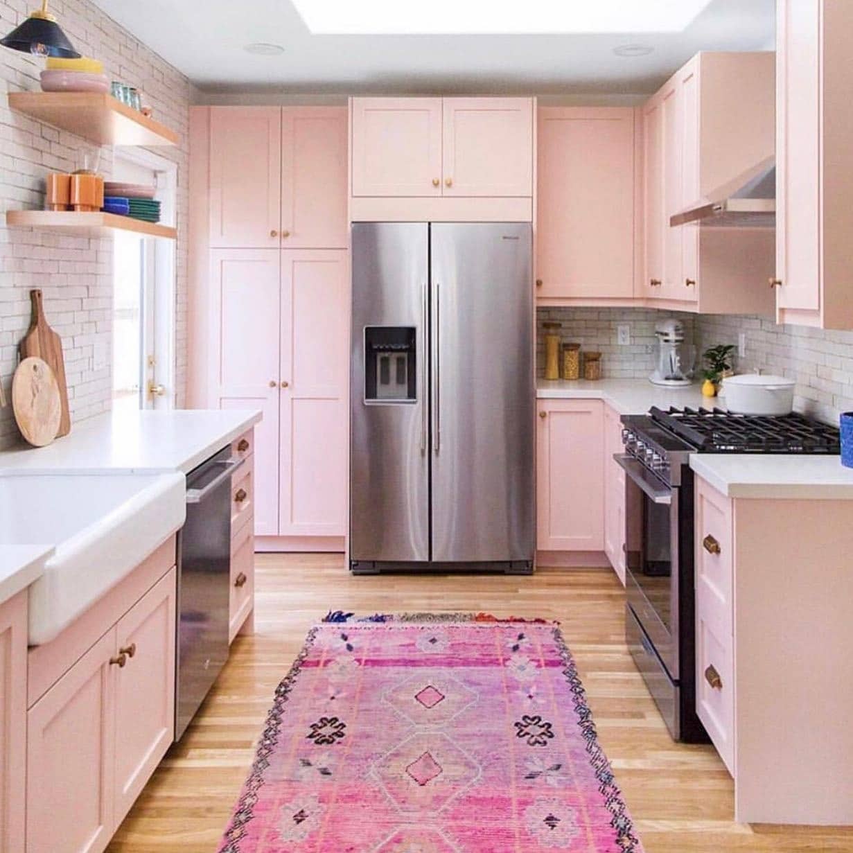 2. Classic Pastel Pink Kitchen with Brass Details - pink kitchen ideas