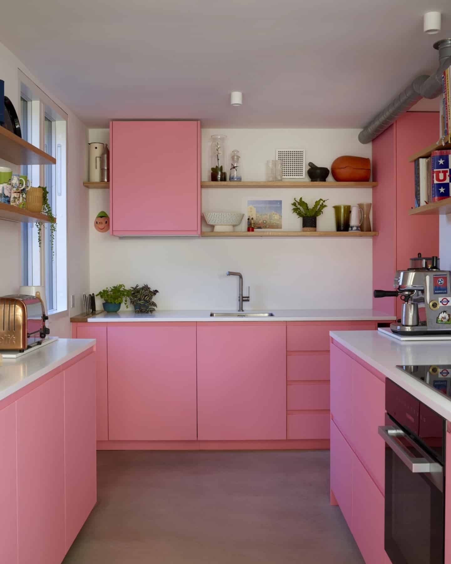 7. Peachy Pink Traditional Kitchen with Decorative Touches - pink kitchen ideas