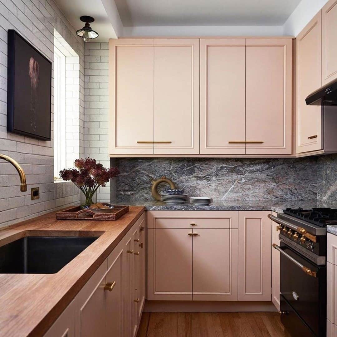 8. Minimalist Pink Flat-Panel Kitchen with Clean Lines - pink kitchen ideas