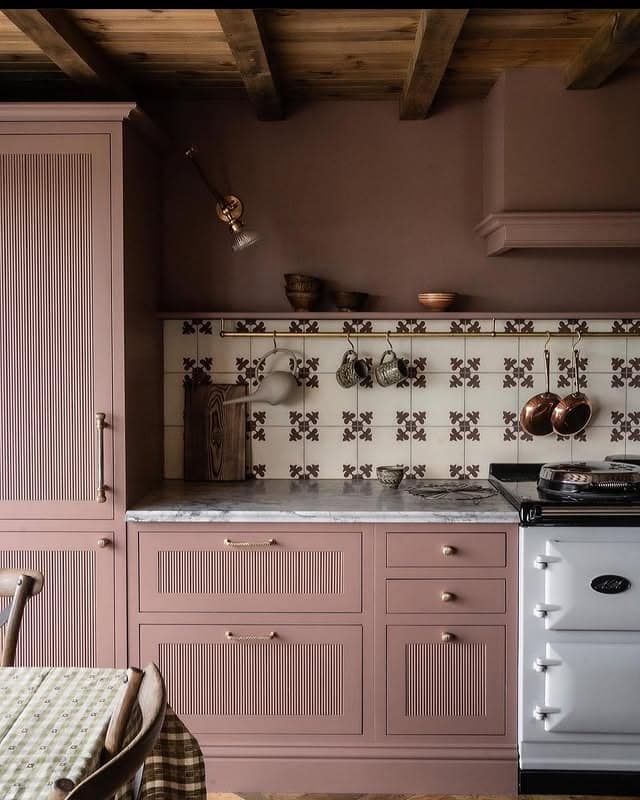 12. Vintage Dusty Pink Kitchen with Patterned Tile Backsplash - pink kitchen ideas