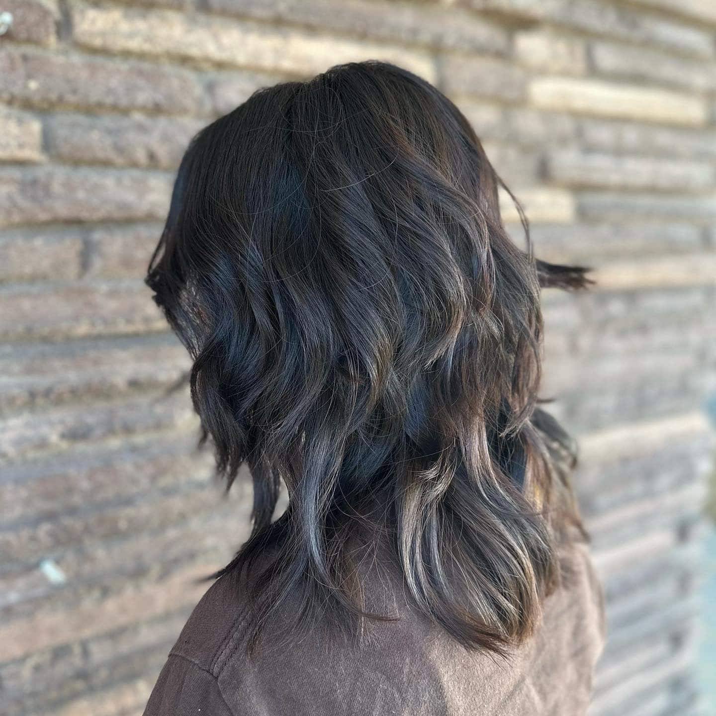 8. Dimensional Dark Brunette Wolf Cut with Subtle Highlights - Wolf Haircut