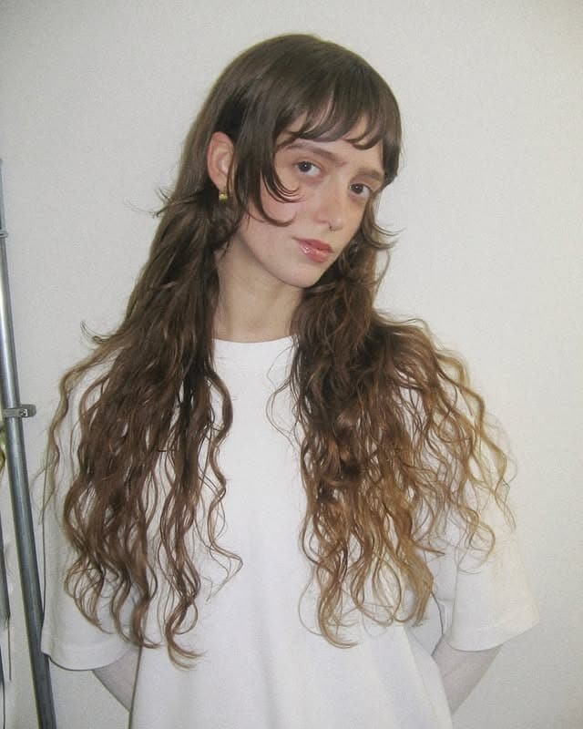 13. Natural Brunette Curly Wolf Cut with Soft Fringe - Wolf Haircut