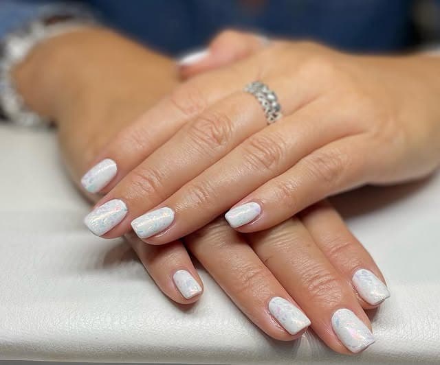1. Soft White Shimmer Short Square Nails - white nail ideas