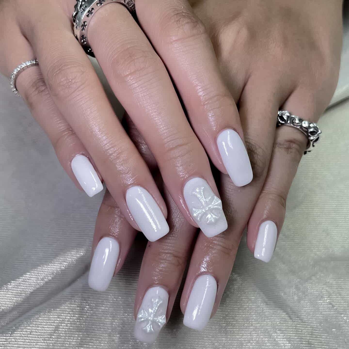 5. White Square Nails with Floral Accent Art - white nail ideas