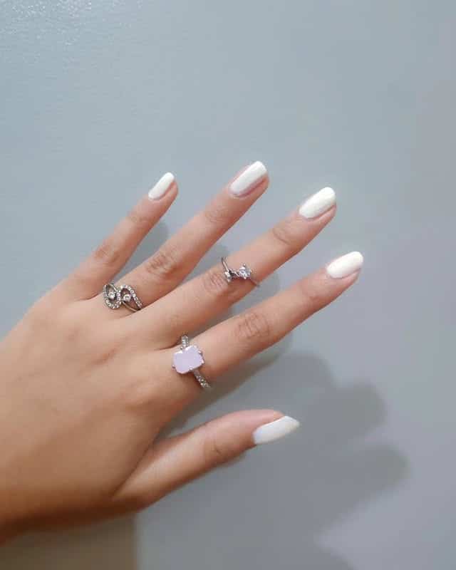 17. Soft White Almond Nails with Subtle Shine - white nail ideas