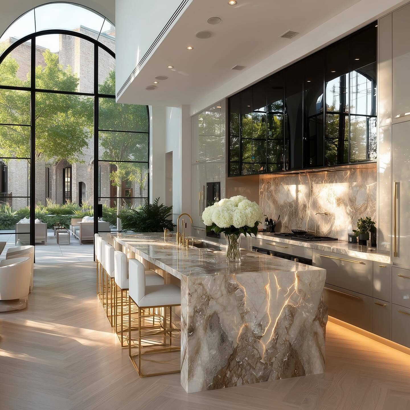 2. Grand Open-Concept Kitchen with Dramatic Marble Island - luxury kitchen ideas