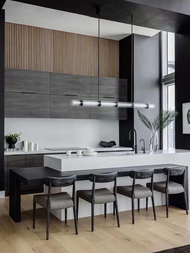 6. Light-Filled Marble Kitchen with Soft Cream Palette - luxury kitchen ideas